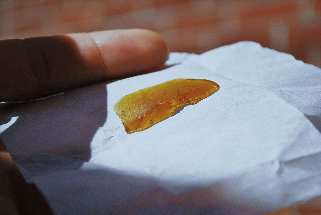 Image of CBD Shatter on parchment paper