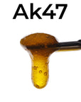 Image of Ak47 CBD Live Resin dripping from dab tool