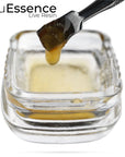 TruEssence Live Resin dripping from a dab tool.