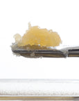 Close up image of Lava Kush Mixed CBD Live Resin on dab tool.