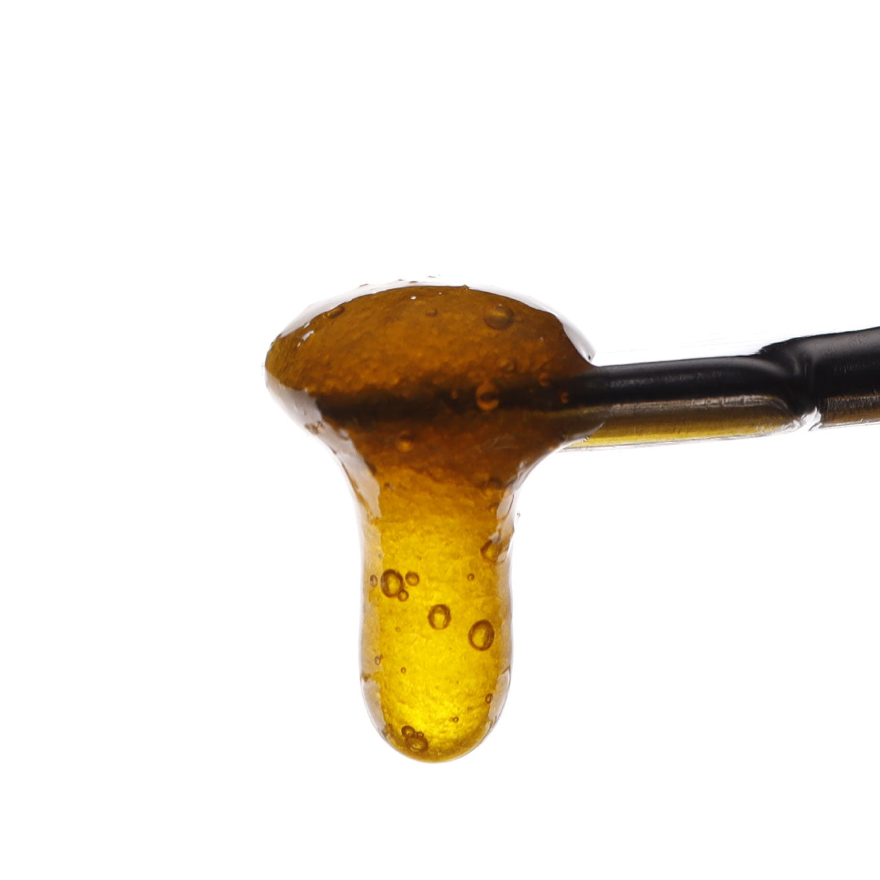 Image of Ak47 CBD Live Resin dripping from a dab tool.