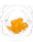Image of a glass jar containing 1 gram of broad spectrum CBD Sugar Wax.