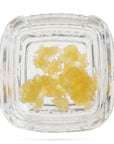 Image of a Calyx jar containing 1 gram of Garlic Jam Mixed CBD Live Resin.
