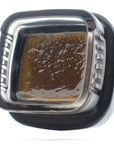 Image of a Calyx jar containing 1 gram of Hawaiian Haze CBD Live Resin.