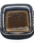 Image of a Calyx jar containing 1 gram of Hawaiian Haze CBD Live Resin.