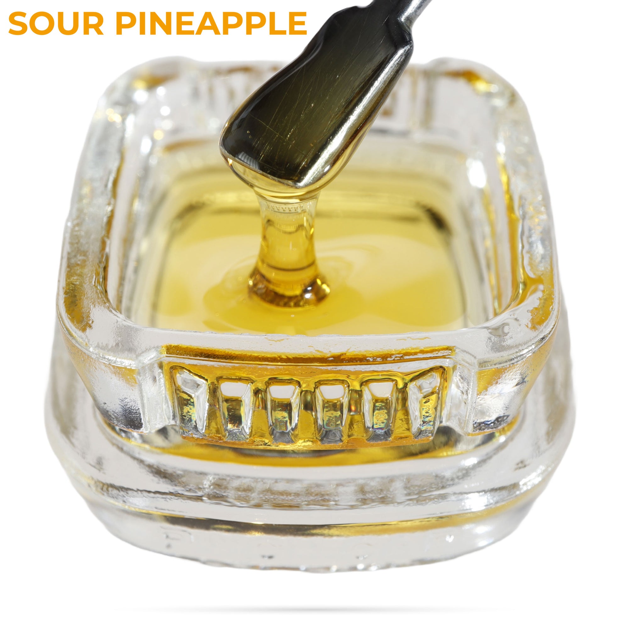 Image of Sour Pineapple CBD Live Resin dripping from a dab tool into a calyx container.