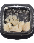 Image of a Calyx jar containing 1 gram of Tropical Blast CBD Wax.
