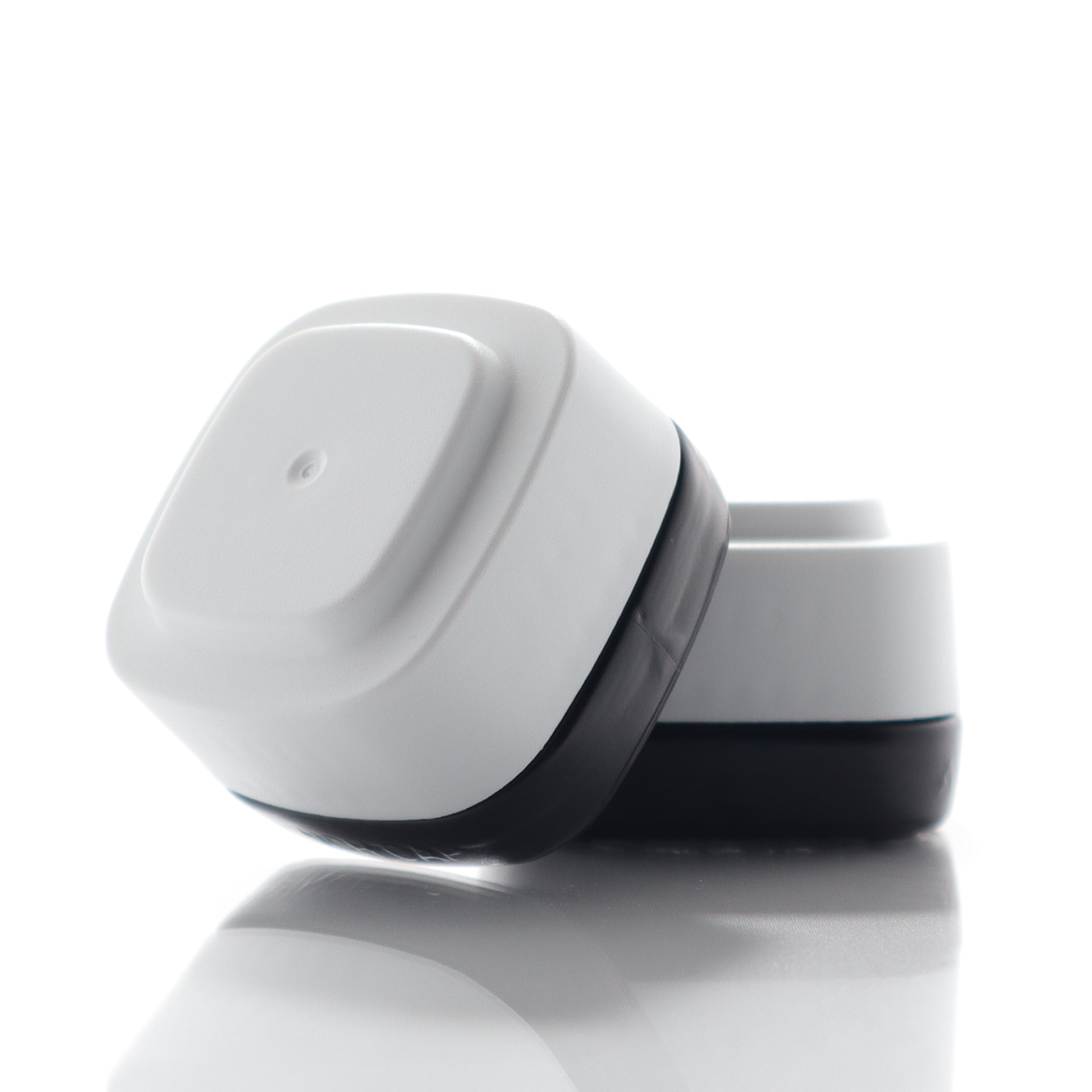 Black 7ml Calyx containers with white lids