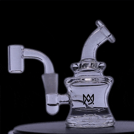 MJ Arsenal Mini Dab Rig. Price of a Daily Driver, Rips Like a Weekend Exotic. Extra Thick 4mm Borosilicate Glass. Reinforced Base-Connected Perc to Seal it All Together. Why Mini Dab Rigs™? Less Air = More Flavor. MOST DIVERSE CBD CONCENTRATE COLLECTION ON THE WEB. Live Resin, Wax, Shatter &MORE! Glass Rigs, Pipes. Dab, Vape, Smoke Accessories - Sauce Warehouse