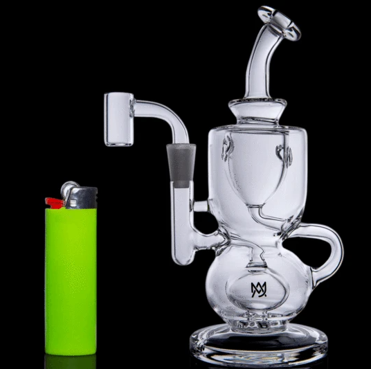 MJ Arsenal Titan Mini Dab Rig. Features a Double Ball Base Connected Perc, with a Klein Draining Incycler. Stack Bubbles, and Enjoy Your Terps Like Never Before with this Borosilicate Glass Mini Rig. Why Mini Dab Rigs™? Less Air = More Flavor. MOST DIVERSE CBD CONCENTRATE COLLECTION ON THE WEB. Glass Rigs, Pipes. Dab, Vape, Smoke Accessories - Sauce Warehouse