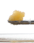 Close up image of Sour Tsunami Mixed CBD Live Resin on a dab tool.