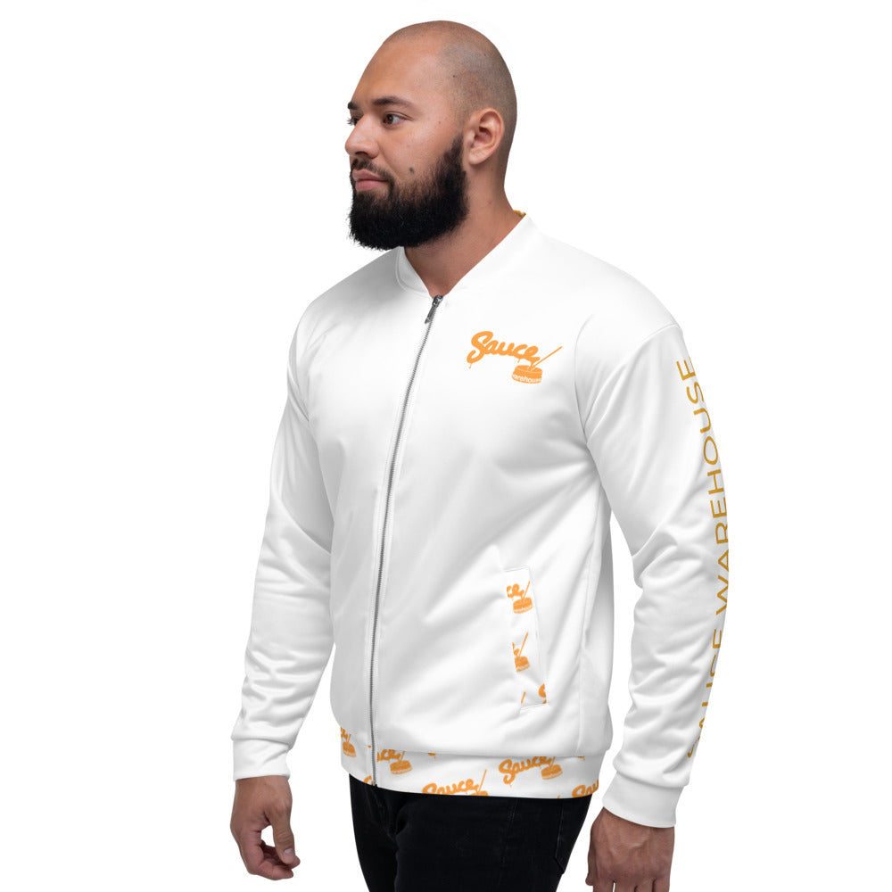 The front of the Sauce Warehouse Baller jacket features a Sauce Warehouse logo on the left chest and patterned logos over the pockets. "Sauce Warehouse" covers the outside of the left sleeve. For the ballers and connoisseurs. Shop bulk CBD Concentrates, clothing, and dabbing accessories at Sauce Warehouse